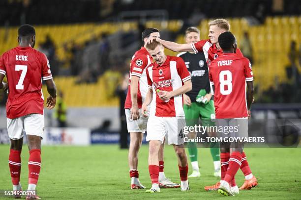 Antwerp's Arthur Vermeeren, Antwerp's Zeno Van Den Bosch and celebrate after winning a soccer game between Greek AEK Athens FC and Belgian soccer...