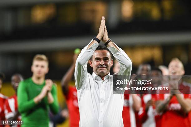 Antwerp's director of football Marc Overmars celebrates after winning a soccer game between Greek AEK Athens FC and Belgian soccer team Royal Antwerp...