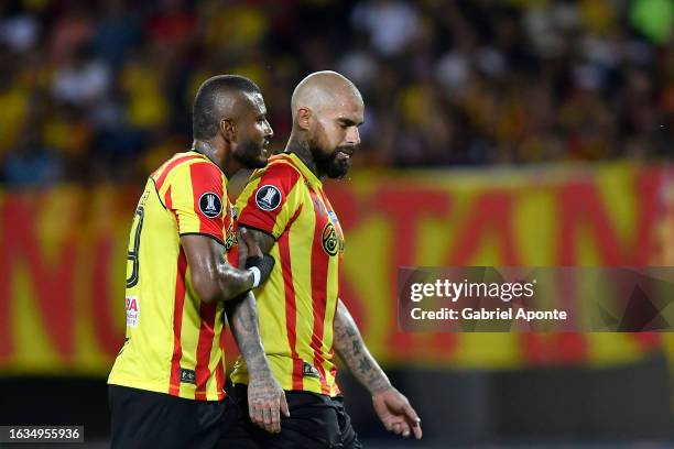 Juan Quintero of Deportivo Pereira leaves the pitch with help by teammate Carlos Ramírez after being injured during a Copa CONMEBOL Libertadores 2023...