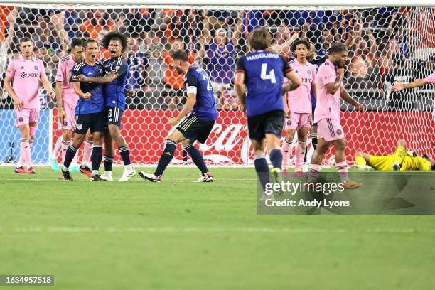 Yuya Kubo of FC Cincinnati celebrates with his teammates after scoring the game tying goal against the Inter Miami CF in the 114th minute of extra...