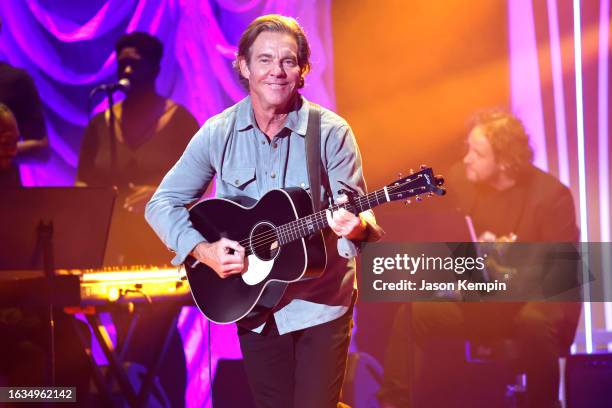 Dennis Quaid performs onstage during the 16th Annual Academy of Country Music Honors at Ryman Auditorium on August 23, 2023 in Nashville, Tennessee.