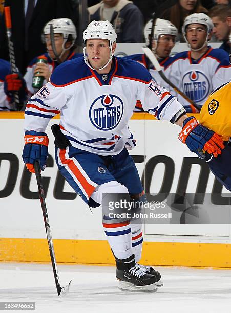 Ben Eager of the Edmonton Oilers skates against the Nashville Predators during an NHL game at the Bridgestone Arena on March 8, 2013 in Nashville,...