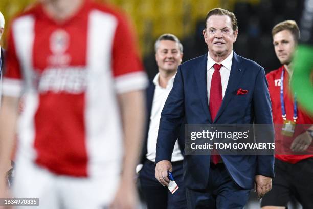 Antwerp owner Paul Gheysens celebrates after winning a soccer game between Greek AEK Athens FC and Belgian soccer team Royal Antwerp FC, Wednesday 30...