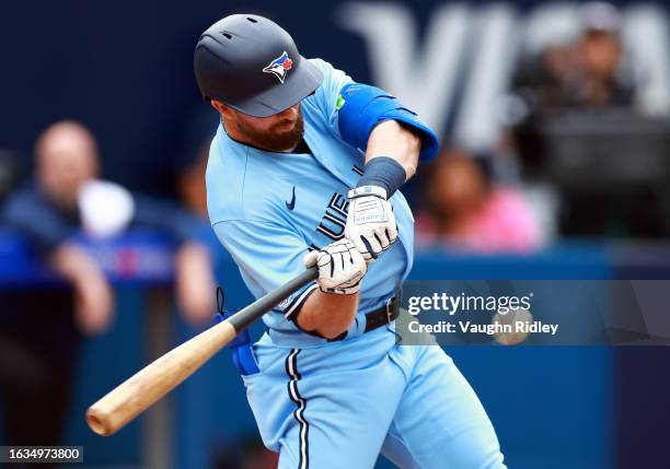 Mason McCoy of the Toronto Blue Jays makes his major league debut in the eighth inning against the Washington Nationals at Rogers Centre on August...