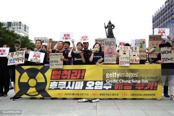 South Korean protesters participate in a rally against the Japanese government's decision to release treated radioactive water into the Pacific...