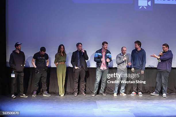 Cast and crew speak onstage at the "You're Next" Q&A during the 2013 SXSW Music, Film + Interactive Festival at Topfer Theatre at ZACH on March 10,...