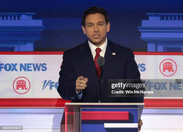Republican presidential candidate, Florida Gov. Ron DeSantis pauses during a break in the first debate of the GOP primary season hosted by FOX News...