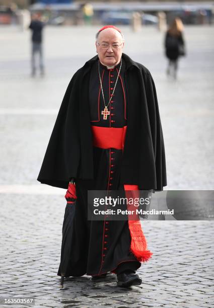 Italian cardinal Renato Martino walks through St Peter's Square on his way to the Final General Congregation on March 11, 2013 in Vatican City,...