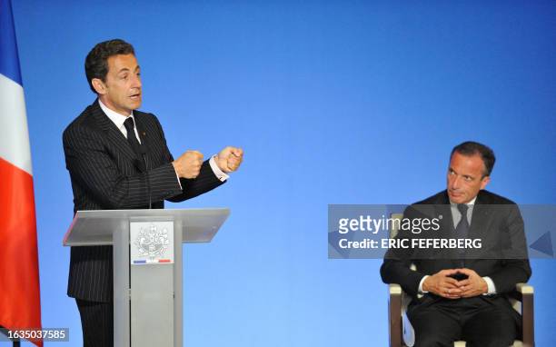 French President Nicolas Sarkozy delivers a speech next to Henri Proglio , CEO of Veolia Environnement, a French group specialized in environmental...