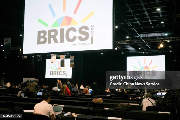 Journalists work at the media center of the 15th BRICS Summit on August 23, 2023 in Johannesburg, South Africa.