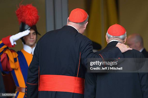 Cardinal Timothy Dolan arrives for the final congregation before cardinals enter the conclave to vote for a new pope, on March 11, 2013 in Vatican...