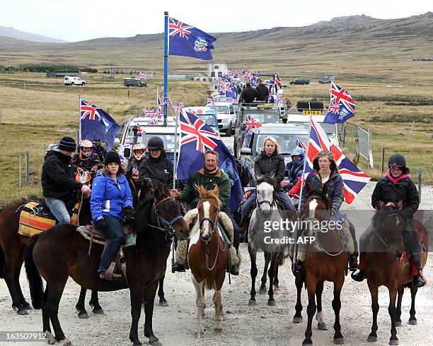 Islanders take part in the "Proud to be British" parade along Ross Road in Port Stanley, Falkland Islands, on March 10, 2013. Falkland Islanders were...