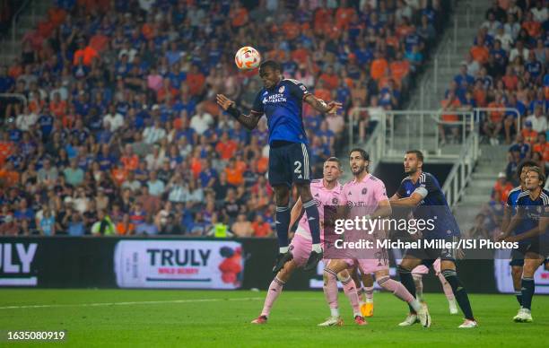 Alvas Powell of Cincinnati FC heads the ball over Inter Miami defenders during the U.S. Open Cup Semifinal game between Inter Miami CF and FC...
