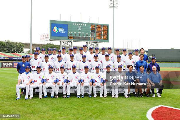 Team Chinese Taipei poses for a team photo before Pool B, Game 1 between Team Australia and Team Chinese Taipei during the first round of the 2013...