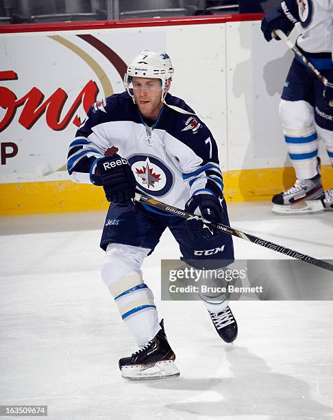 Derek Meech of the Winnipeg Jets skates against the New Jersey Devils at the Prudential Center on March 10, 2013 in Newark, New Jersey. The Devils...