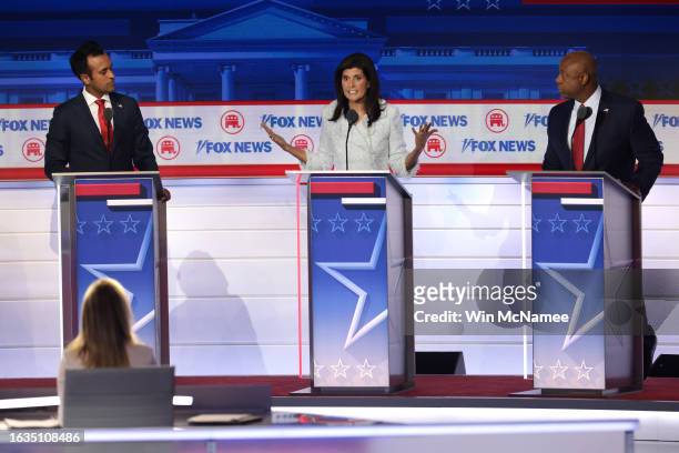 Republican presidential candidates , Vivek Ramaswamy, former U.N. Ambassador Nikki Haley and U.S. Sen. Tim Scott participate in the first debate of...