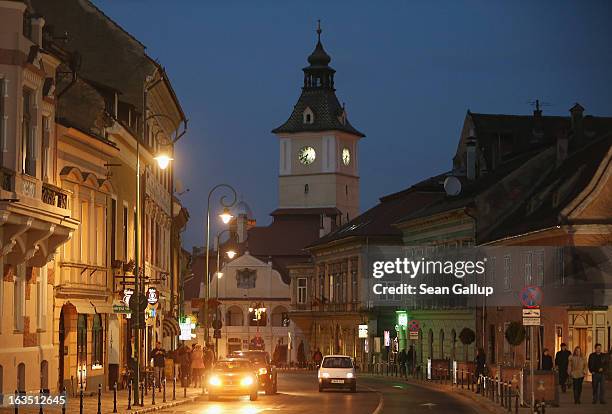 The trumpeter's tower of the former Council House, built in 1420, stands among houses in the historic district on March 9, 2013 in Brasov, Romania....