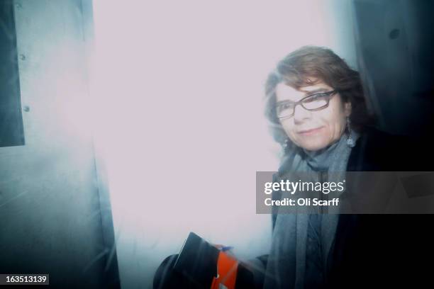 Vicky Pryce, ex-wife of Chris Huhne, leaves Southwark Crown Court in a prison van after being sentenced on March 11, 2013 in London, England. Former...