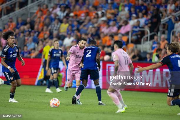 Lionel Messi and Alvas Powell in action during the semifinal of the Lamar Hunt U.S. Open Cup 2023. Inter Miami CF went on to beat FC Cincinnati on...