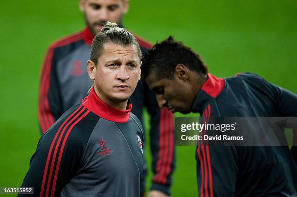 Philippe Mexes of AC Milan looks on during the training session ahead of their UEFA Champions League round of 16 second leg against FC Barcelona at...