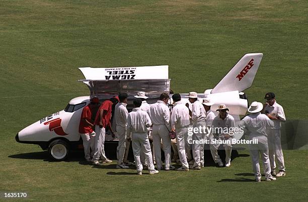 The Australia team take a break with the drinks van during the third test between India and Australia played in Bangalore, India. Australia won the...