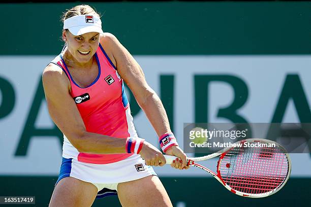 Nadia Petrova of Russia returns a shot to Julia Goerges of Germany during the BNP Paribas Open at the Indian Wells Tennis Garden on March 11, 2013 in...