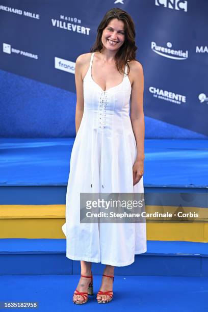 Actress Laetitia Casta attends the 'Le Bonheur est pour demain' photocall during Day Two of the 16th Angouleme French-Speaking Film Festival on...