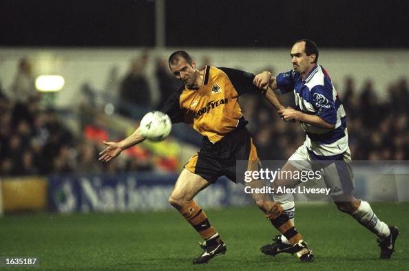 Steve Bull of Wolves fends off a tackle from a QPR player Steve Bull of Wolves fends off a tackle from a QPR player