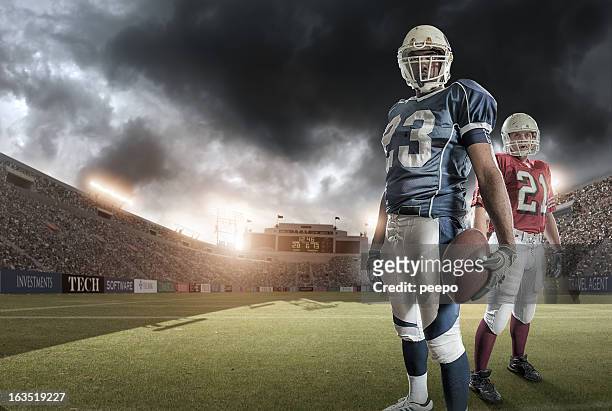 american football heroes - american football field low angle stock pictures, royalty-free photos & images