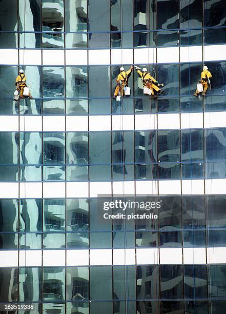 tower glass cleaning - facade cleaning stock pictures, royalty-free photos & images