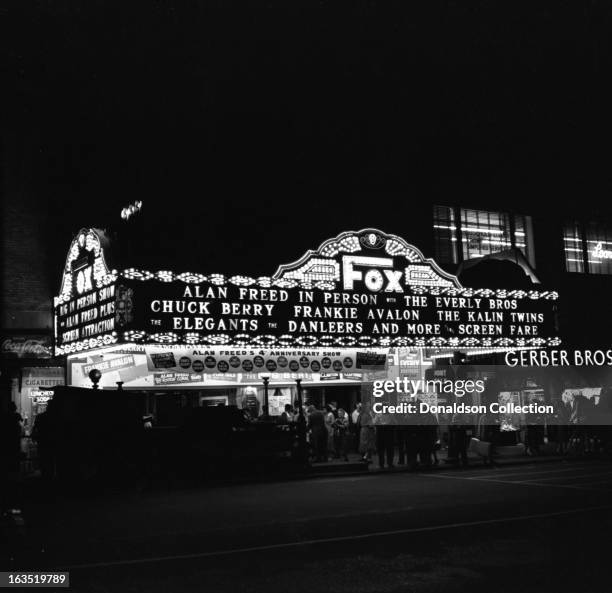 The marquee at the Brooklyn Fox Theater reads "Alan Freed In Person, with The Everly Brothers, Chuck Berry, Frankie Avalon, The Kalin Twins, The...