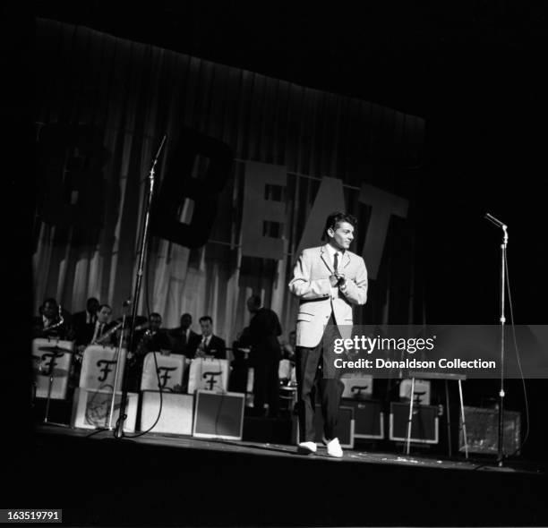 Singer Frankie Avalon performs onstage during Alan Freed's 4th anniversary rock and roll show "The Big Beat" at the Brooklyn Fox Theater on August...