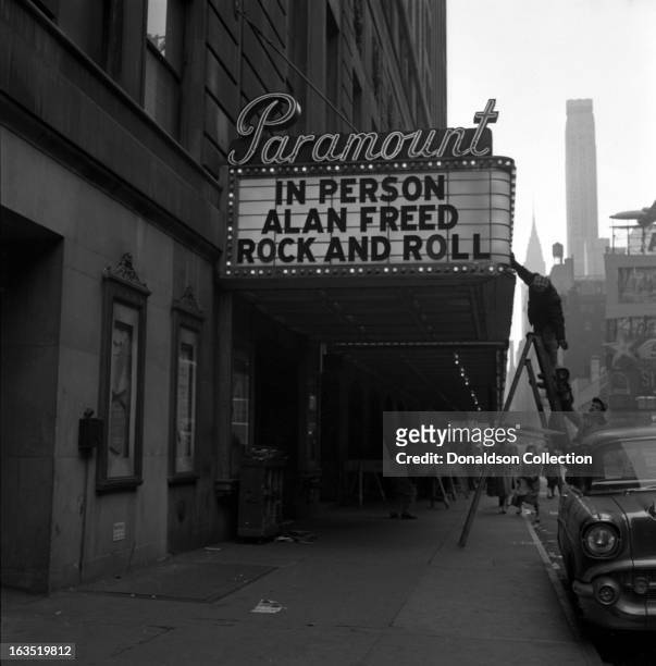 The marquee New York Paramount Theatre reads "In Person Alan Freed Rock And Roll" on February 22, 1957 at the Paramount Theatre in New York, New York.