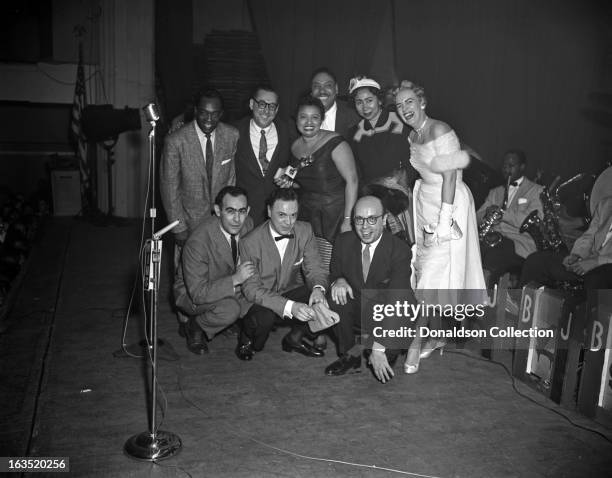 Buddy Johnson UNDIENTIFIED, Ella Johnson, Big Big Joe Turner, his wife and Jackie Freed with Jerry Wexler, Alan Freed and Ahmet Ertegun pose for a...