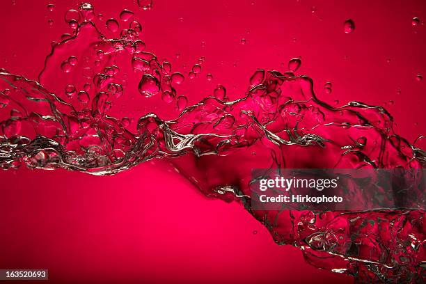 rosa wasser splash - saft stock-fotos und bilder