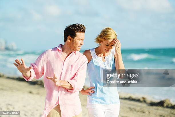 mature couple having difficult relationship - midlife crisis stock pictures, royalty-free photos & images