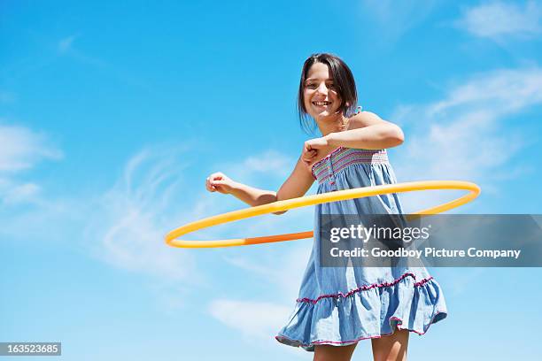 she can hoola for hours - plastic hoop stock pictures, royalty-free photos & images