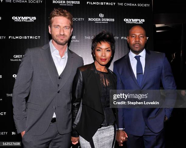 Actor Gerard Butler, actress Angela Bassett, and director Antoine Fuqua attend The Cinema Society with Roger Dubuis and Grey Goose screening of...