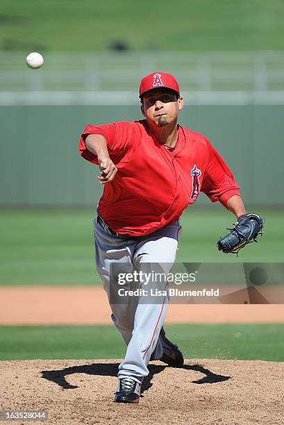 Ernesto Frieri of the Los Angeles Angels of Anaheim pitches against the Kansas City Royals at Surprise Stadium on March 10, 2013 in Surprise, Arizona.