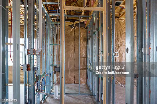 metal beam construction on a residential structure - metal studs stock pictures, royalty-free photos & images