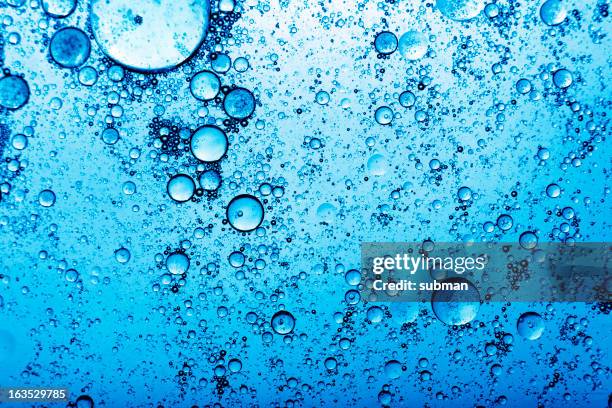 blue bubbles abstract - carbonated drink stock pictures, royalty-free photos & images