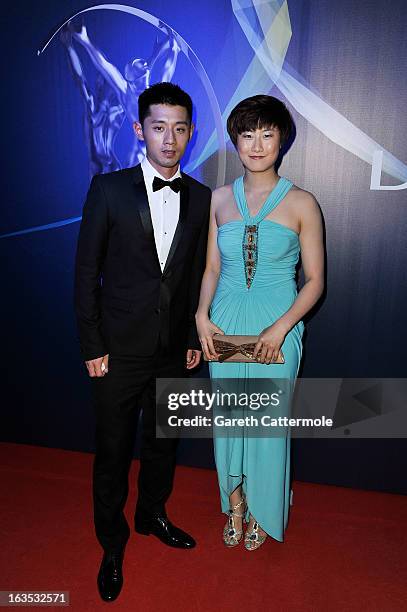 Table Tennis players Zhang Jike and Ding Ning attends the 2013 Laureus World Sports Awards at the Theatro Municipal Do Rio de Janeiro on March 11,...