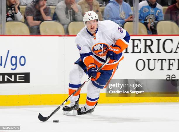 Brad Boyes of the New York Islanders moves the puck against the Pittsburgh Penguins on March 10, 2013 at Consol Energy Center in Pittsburgh,...