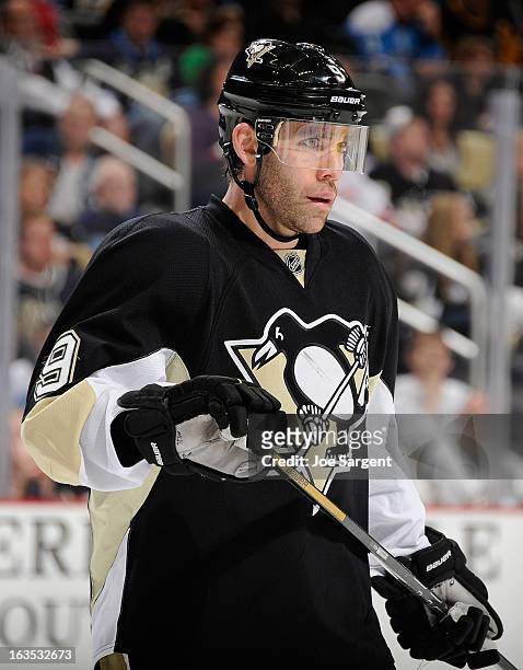 Pascal Dupuis of the Pittsburgh Penguins skates against the New York Islanders on March 10, 2013 at Consol Energy Center in Pittsburgh, Pennsylvania.