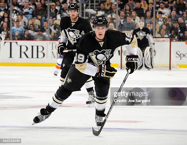 Beau Bennett of the Pittsburgh Penguins skates against the New York Islanders on March 10, 2013 at Consol Energy Center in Pittsburgh, Pennsylvania.