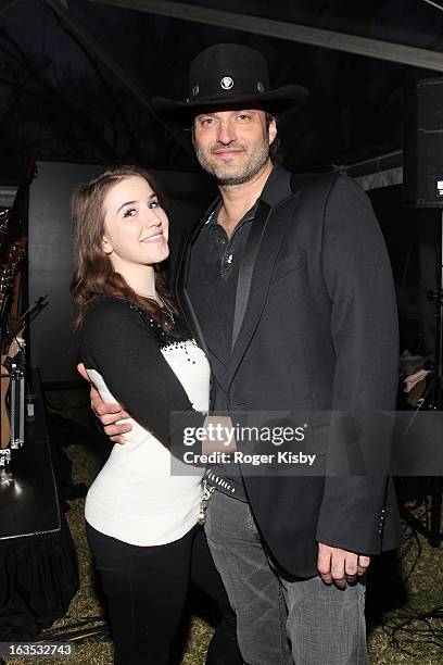 Marcie Madison and Robert Rodriguez attend Forbes' "30 Under 30" SXSW Private Party on March 11, 2013 in Austin, Texas.