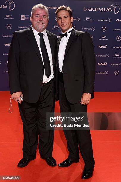 Swimmer Chad le Clos of South Africa and his father, Bert le Clos attends the 2013 Laureus World Sports Awards at the Theatro Municipal Do Rio de...