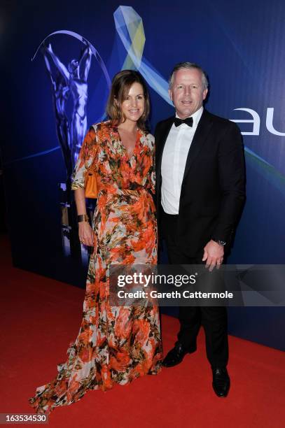 Laureus Academy Member Sean Fitzpatrick and guest attends the 2013 Laureus World Sports Awards at the Theatro Municipal Do Rio de Janeiro on March...