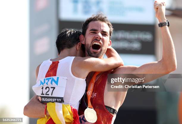 Gold medalists Maria Perez of Team Spain and Alvaro Martin of Team Spain celebrate after winning their Men's and Women's 35 Kilometres Race Walk...