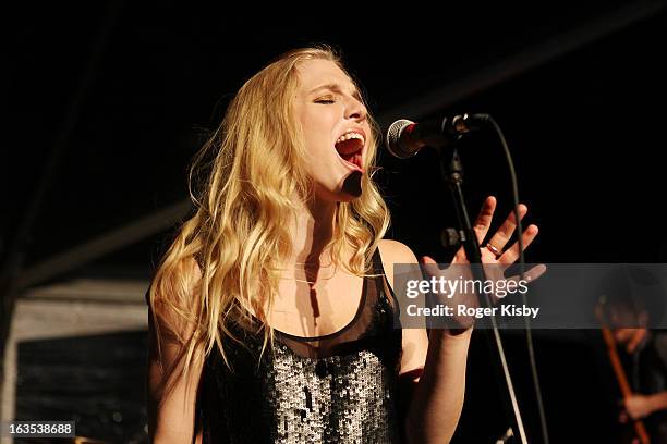 Band members of Delta Rae perform onstage at Forbes' "30 Under 30" SXSW Private Party on March 11, 2013 in Austin, Texas.